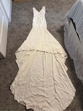 Pronovias Ivory V-Neck Wedding Gown with Long Train